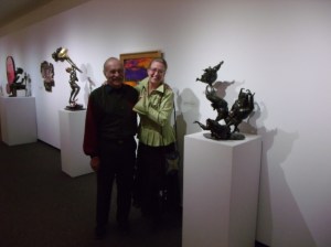Chick Schwartz and Laura Matson Hahn by his work: Angles on the Head of a Pin