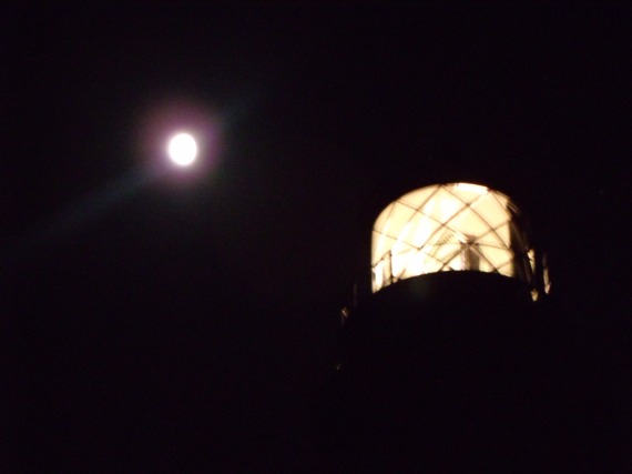 Middle of the night I awoke and took this shot of the full moon by the lighthouse!